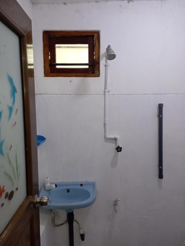 Koupelna v ubytování 152-Abhaya Place Homestay