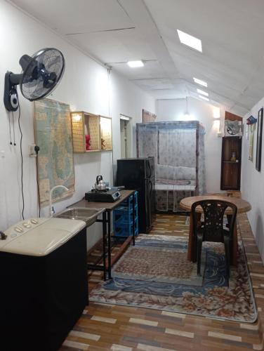 Kuchyň nebo kuchyňský kout v ubytování 152-Abhaya Place Homestay