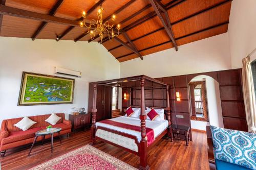 Postel nebo postele na pokoji v ubytování Nishigandha Jal Mahal Resort