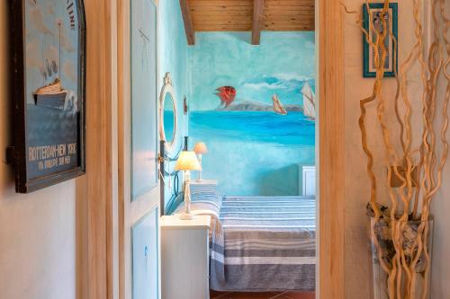 Ένα ή περισσότερα κρεβάτια σε δωμάτιο στο Villa Aurora Con Piscina Privata