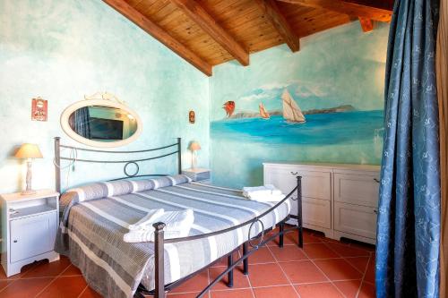 Ένα ή περισσότερα κρεβάτια σε δωμάτιο στο Villa Aurora Con Piscina Privata