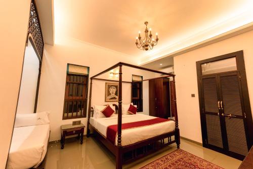 Postel nebo postele na pokoji v ubytování Nishigandha Jal Mahal Resort