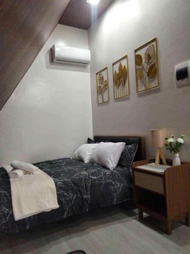 Ένα ή περισσότερα κρεβάτια σε δωμάτιο στο Grand Cabins