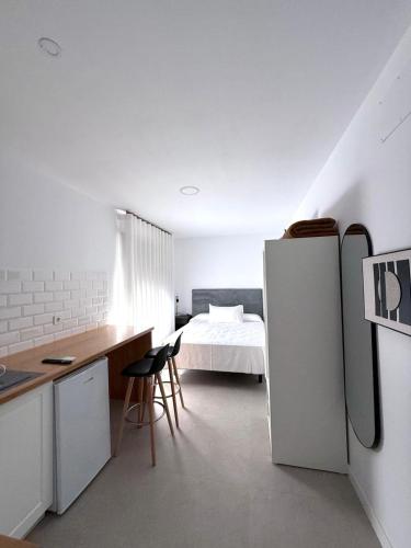 Η κουζίνα ή μικρή κουζίνα στο M&A Hostal