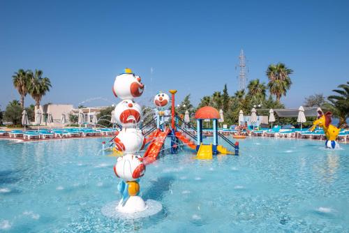 a swimming pool with a water park with a water slide at Royal & Imperial Belvedere Resort in Hersonissos