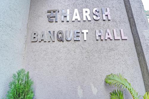 a sign for the chaser banquet hall on a building at Hotel O Saharsh Hotel in Patna