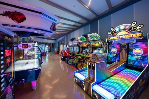 a room with several arcade games in a building at Royal & Imperial Belvedere Resort in Hersonissos