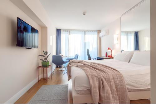Letto o letti in una camera di Orbi city Batumi