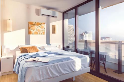 Letto o letti in una camera di Orbi city Batumi