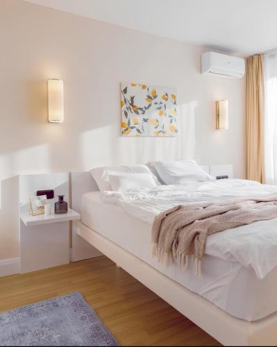 Letto o letti in una camera di Orbi city Batumi