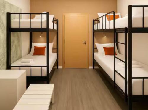 Кровать или кровати в номере Silver Gate Rooms-Diocletian's Palace