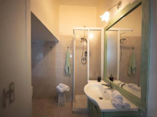 a bathroom with a sink and a shower at Casa Margot by Holiday World in Caprarola