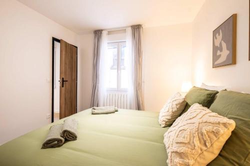 Postel nebo postele na pokoji v ubytování Appartement neuf 1BR 4 pers Proche metro