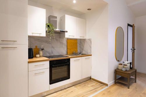 Kuchyň nebo kuchyňský kout v ubytování 2P moderne proche Paris 4 pers