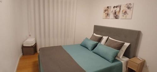 Ένα ή περισσότερα κρεβάτια σε δωμάτιο στο Refúgio Da Pinheira