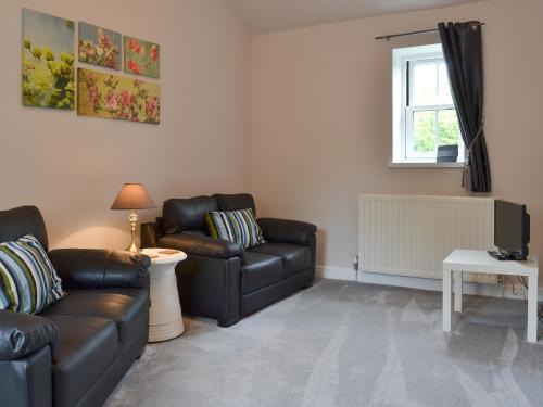 Et opholdsområde på Mill Force Cottage