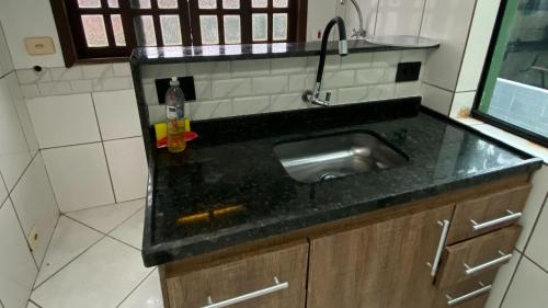 Dapur atau dapur kecil di Apartamentos Boca da Lagoa | Praia, Mata Atlântica e um Pôr do Sol Inesquecível