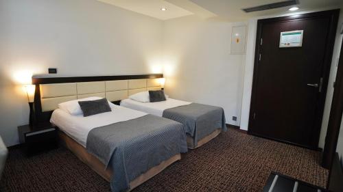 Hotel Diplomatにあるベッド