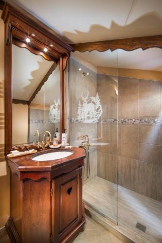 a bathroom with a sink and a shower at Mountain Villa Borovets in Borovets