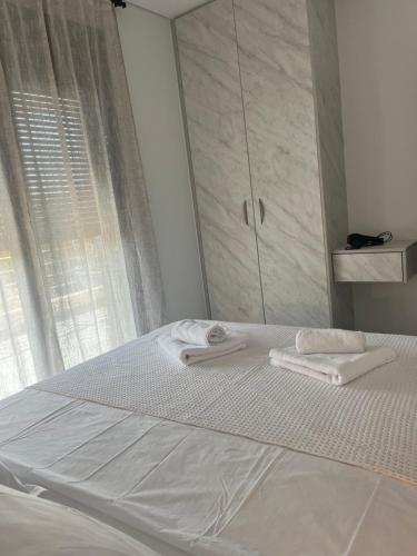 Postel nebo postele na pokoji v ubytování H residence 2