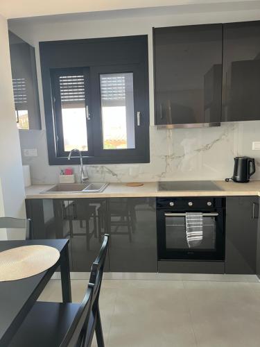 Kuchyň nebo kuchyňský kout v ubytování H residence 2