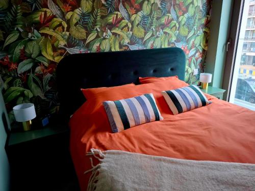 Ένα ή περισσότερα κρεβάτια σε δωμάτιο στο Oostende O'Sea