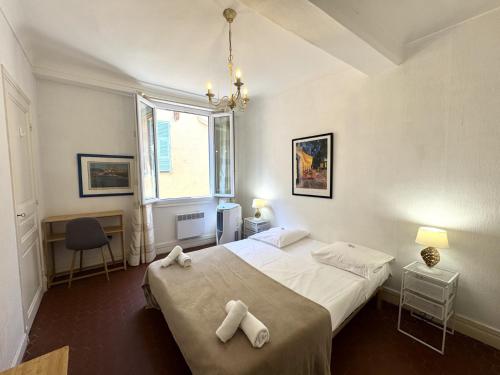 Ένα ή περισσότερα κρεβάτια σε δωμάτιο στο ApartHotel Riviera - BARILLERIE 4 - 3 pieces - Old Town Promenade Anglais