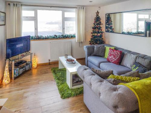 Μια τηλεόραση ή/και κέντρο ψυχαγωγίας στο 8 Vista Apartments