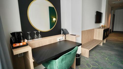 Hotel Diplomatにあるテレビまたはエンターテインメントセンター