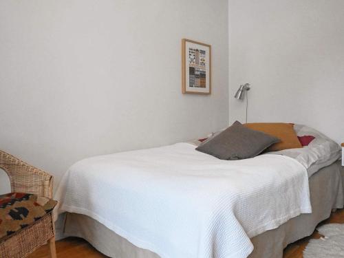 Katil atau katil-katil dalam bilik di 8 person holiday home in LERUM