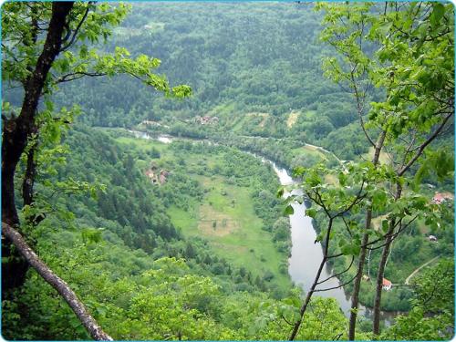a view of a river in the middle of a valley at Holiday Home in Bunjevci with Sauna & Garden in Vrbovsko