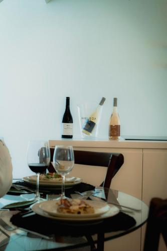 a table with two glasses of wine on it at Once Upon Lisboa in Lisbon