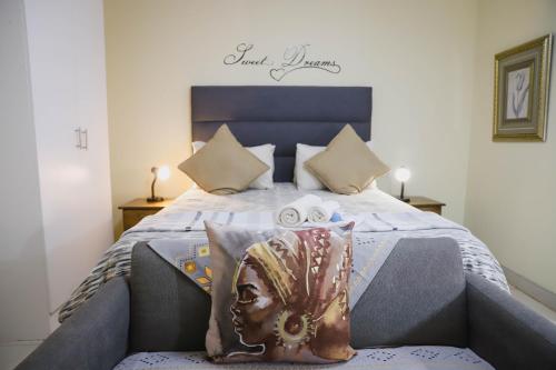 Ένα ή περισσότερα κρεβάτια σε δωμάτιο στο Maroela Guest Lodge