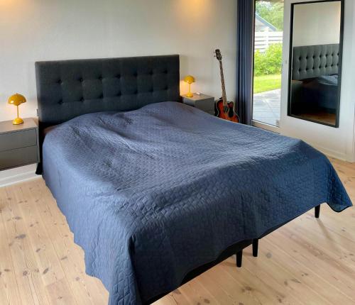 Postel nebo postele na pokoji v ubytování First Row Beach House With Panoramic Views