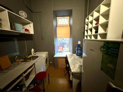 Postel nebo postele na pokoji v ubytování АрАрАт Вокзальна Хостел Hostel Ararat VOKZALNA СВІТЛО Є ЗАВЖДИ!