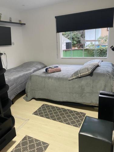 Ένα ή περισσότερα κρεβάτια σε δωμάτιο στο Casa Cremerie Suites