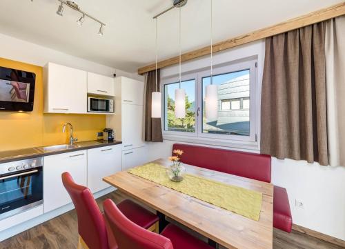 Una cocina o cocineta en Apart Alpin
