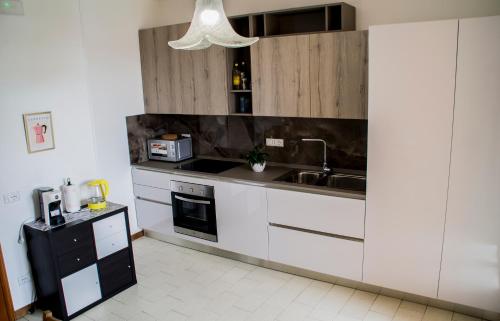 Appartment Navacchio Pisa 2Bにあるキッチンまたは簡易キッチン
