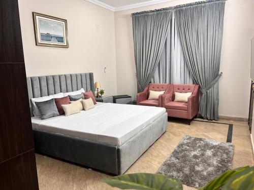 Postel nebo postele na pokoji v ubytování Mohib Home Stay