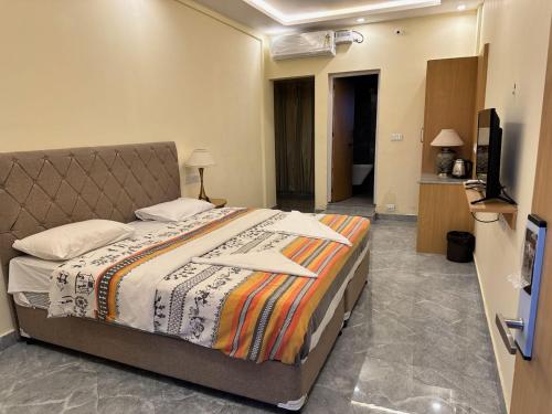 Una cama o camas en una habitación de The Casiita Coorg