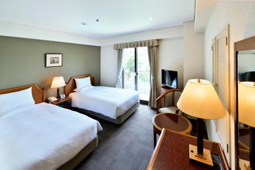Katil atau katil-katil dalam bilik di ANA Crowne Plaza Hotel Nagasaki Gloverhill by IHG