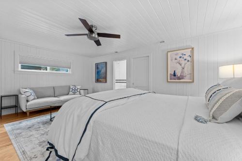 Ένα ή περισσότερα κρεβάτια σε δωμάτιο στο Dahlia House, 3 BDRM Walk To Town