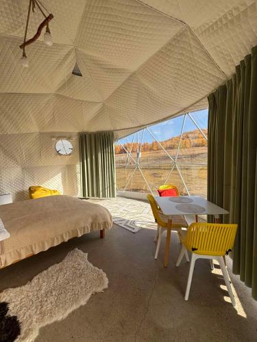 Postel nebo postele na pokoji v ubytování Glamping dome