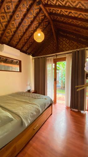 Ένα ή περισσότερα κρεβάτια σε δωμάτιο στο Banana surf and stay