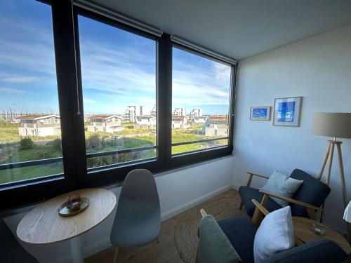 Χώρος καθιστικού στο Apartment Hygge mit Ostseeblick