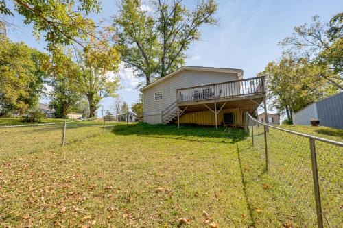 a yard with a fence and a house at Walk to Main Street! Family Home in Williamstown in Williamstown