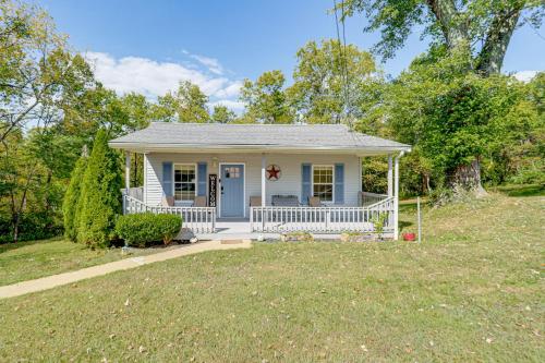 a small blue house with a porch and a yard at Walk to Main Street! Family Home in Williamstown in Williamstown