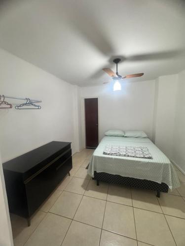 En eller flere senge i et værelse på Quarto Suite