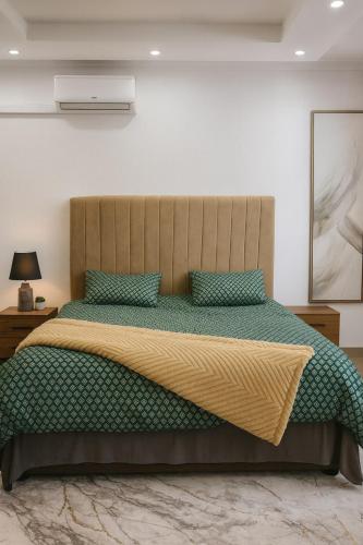 Postel nebo postele na pokoji v ubytování Mutesu Apartments