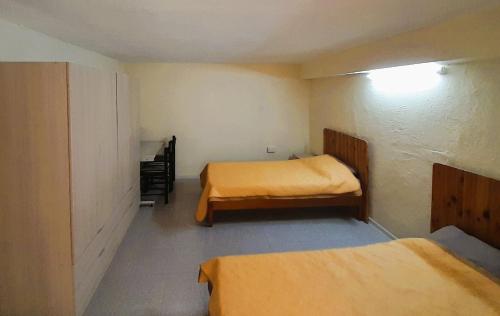 a small room with two beds in it at Bright & Spacious Private Room, Bathroom & Terrace in Swieqi, Prime Location! in Is-Swieqi